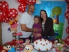 A aniversariante com os pais Mario e Maria 