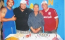 O aniversariante com os netos Anderson, Fernando e Paulo Roberto